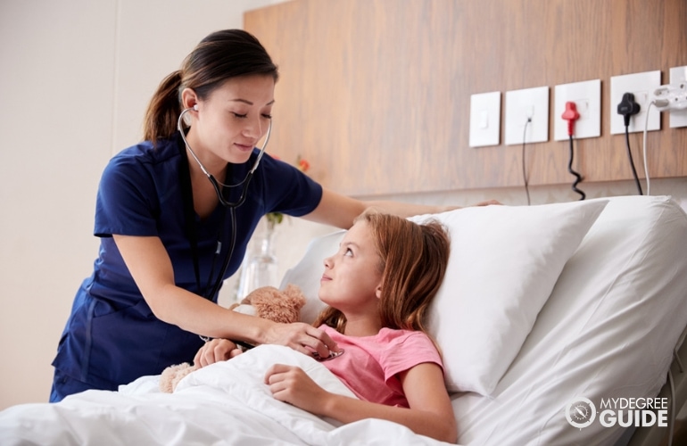 nurse taking care of a child