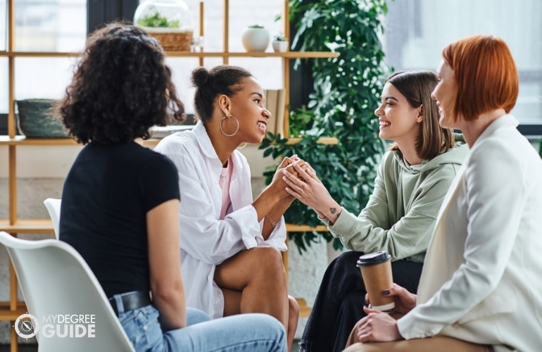 psychologist counseling a group of women