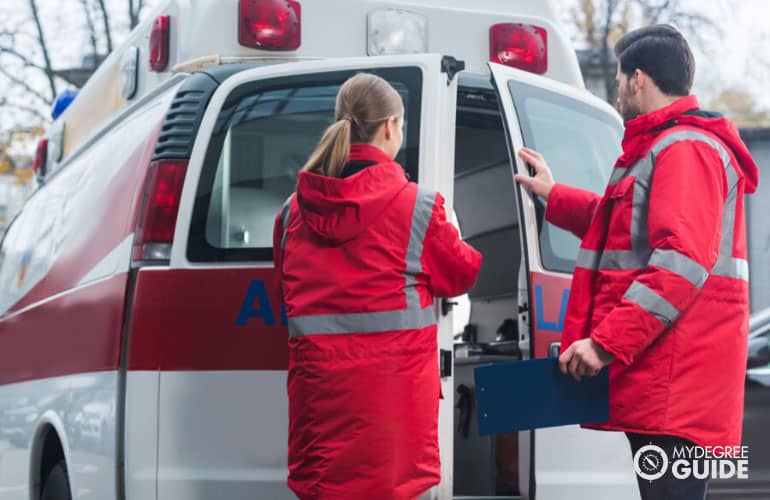 emergency respondents closing an ambulance