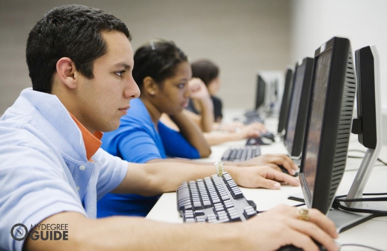 students taking a test on their computers