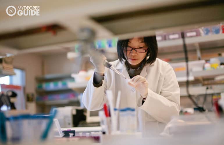 female biomedical engineer working in a laboratory