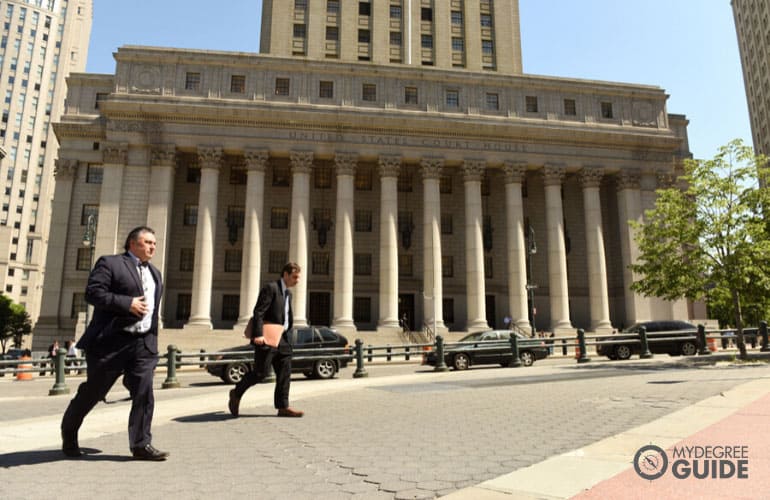 local government workers walking across a court
