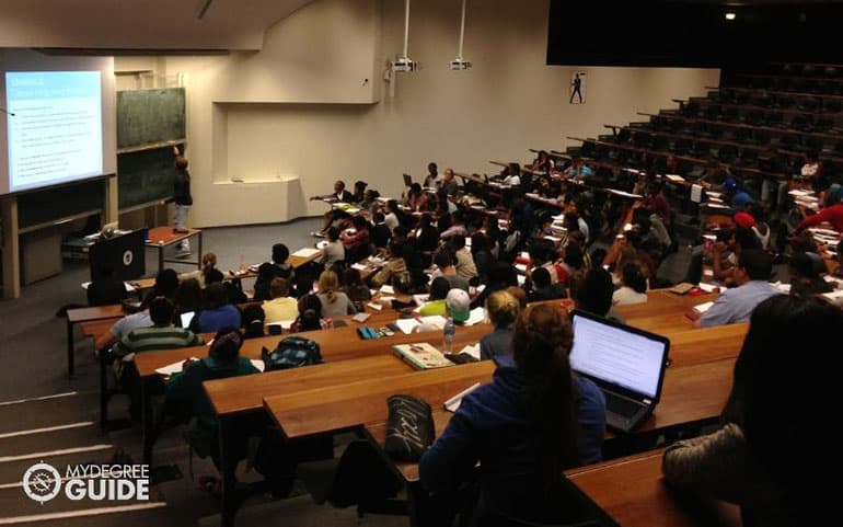 college professor teaching in lecture hall