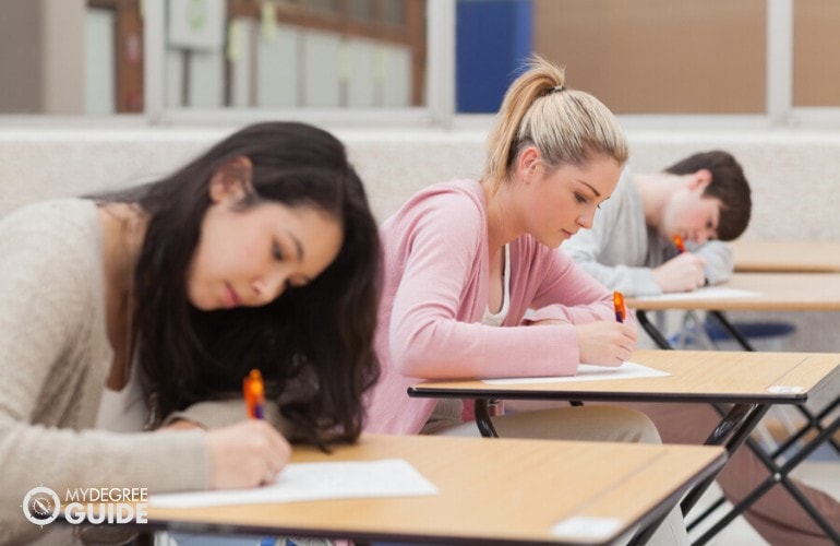 education students taking an exam