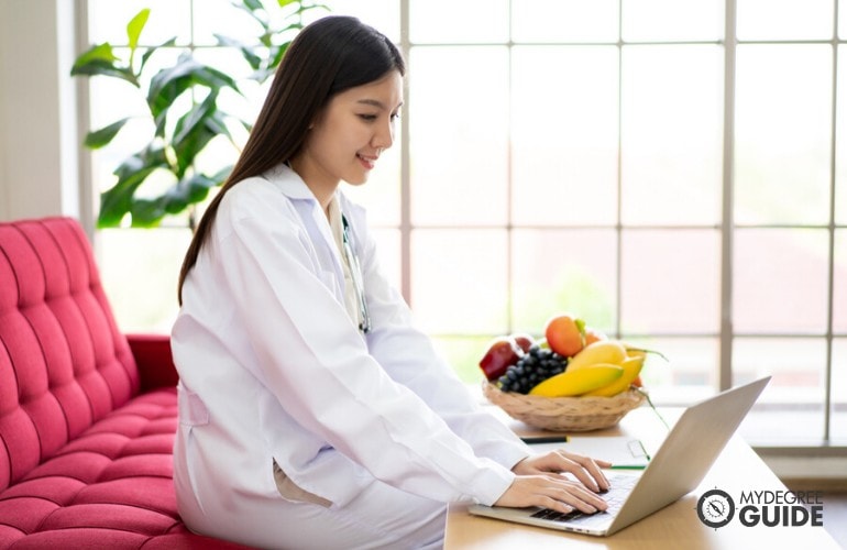 nutritionist working on her laptop