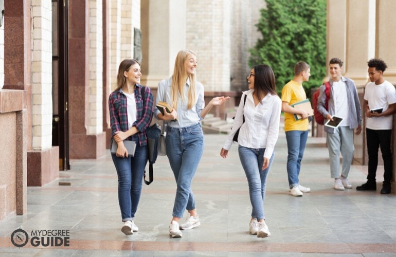 college students walking in university campus