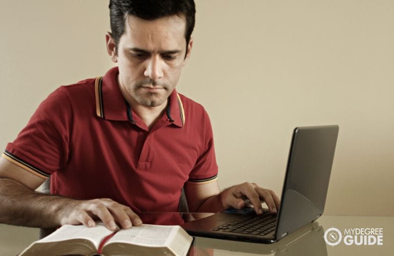 Man pursuing his Biblical Studies Doctorate online
