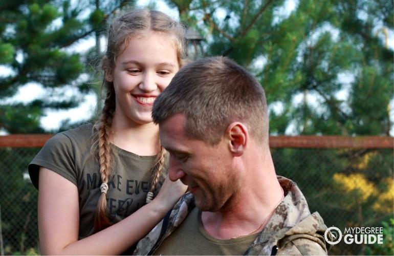 Military Veteran with his daughter