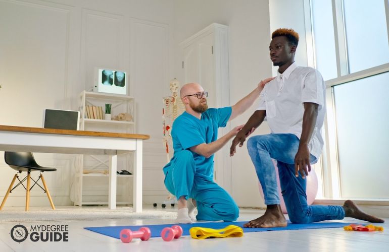 Occupational Therapist guiding a patient