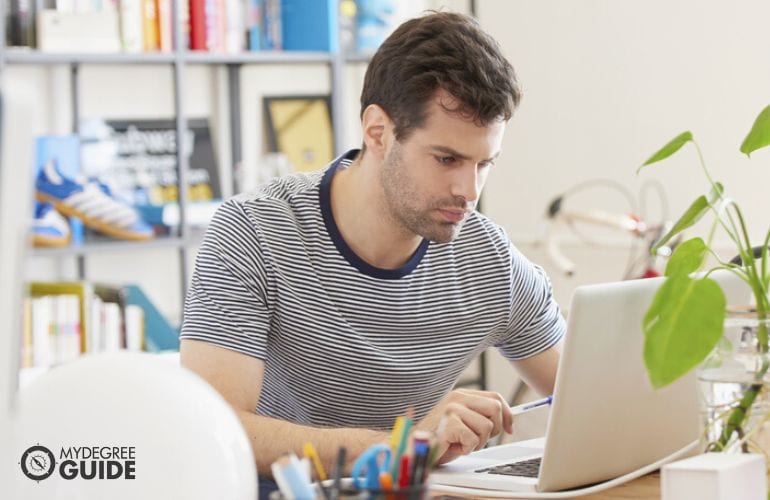Man pursuing Online Master Degree in Graphic Design