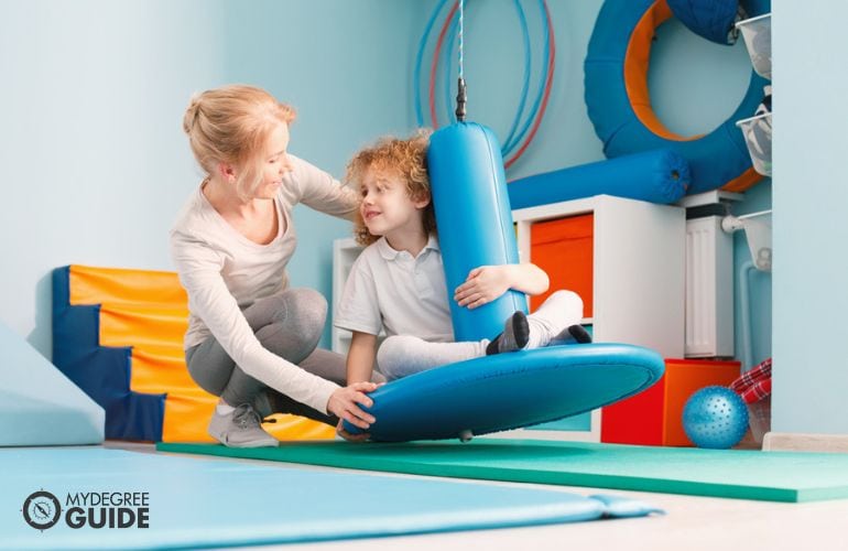 Occupational Therapist in a recreational activity with a patient
