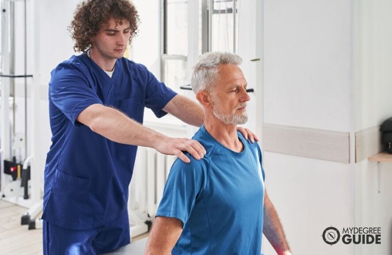 Physical Therapist assessing patients’ progress