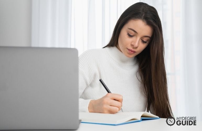 woman taking associates degree online