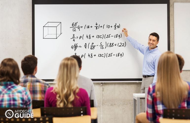 Licensed HS Math teacher discussing in class