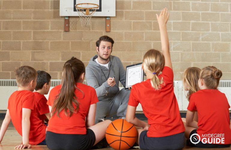 PE teacher and sports coach in school