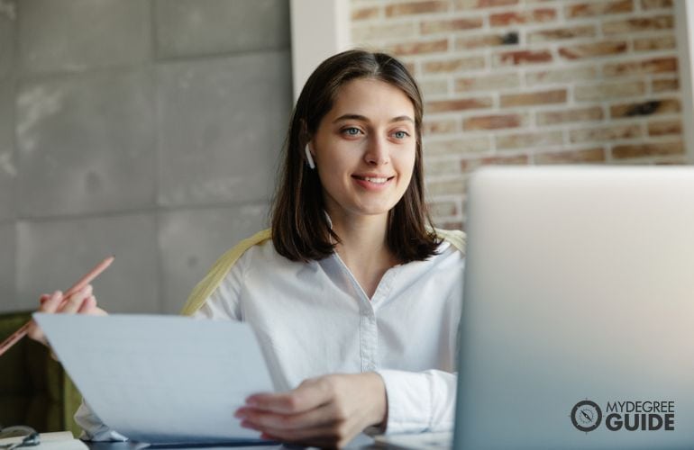 Woman preparing requirements for Bachelor's in Professional Writing