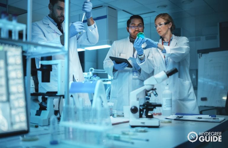 scientific researchers with PhD in Biochemistry