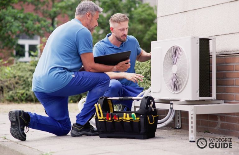 HVAC Technicians working on a commercial ventilation project