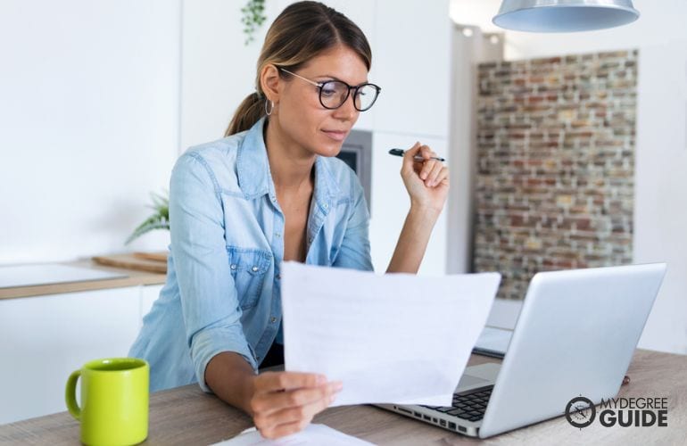 Woman preparing requirements for Online PhD degree
