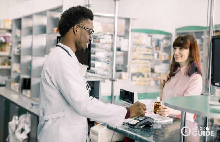 Pharmacy Technician assisting a customer