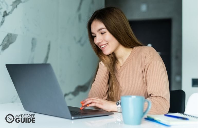 Woman taking online bachelor degree