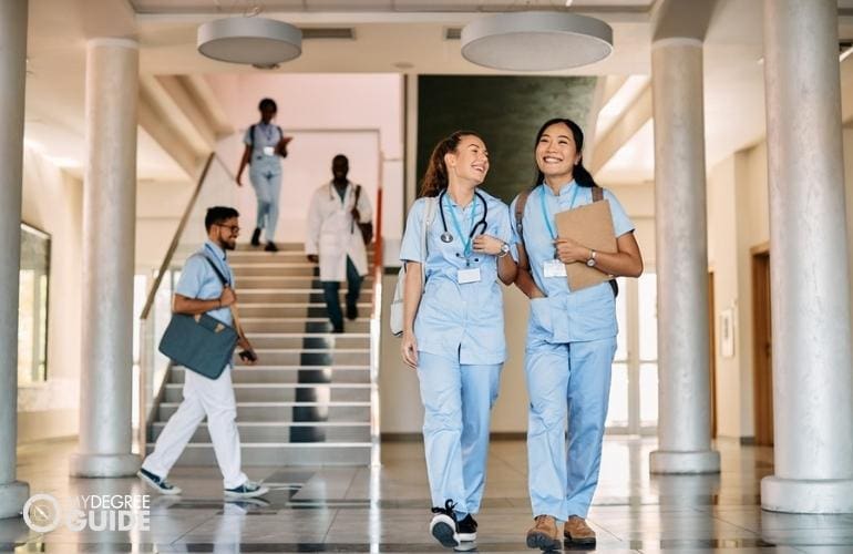nursing students walking in the hallway