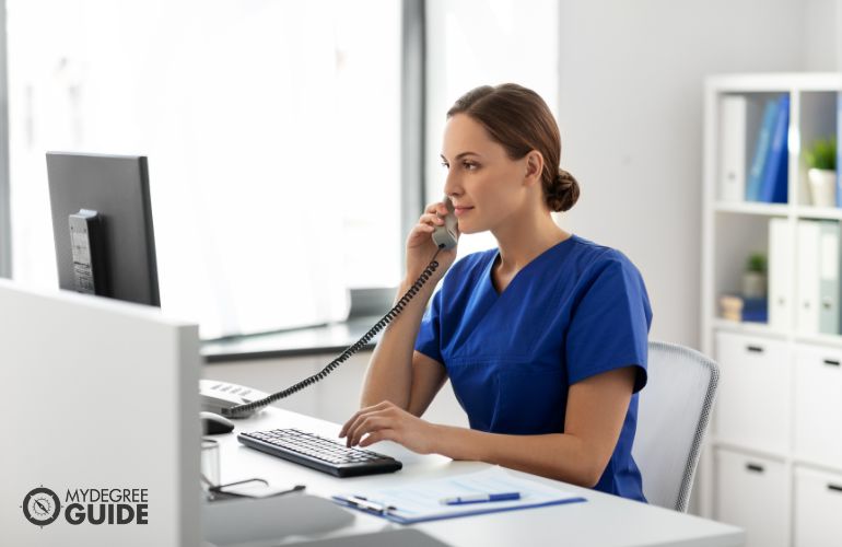 Patient Service Representative talking to a patient on the phone