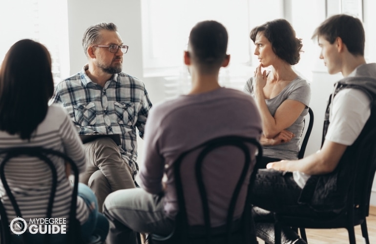 Psychiatric Technician conducting a group counseling 