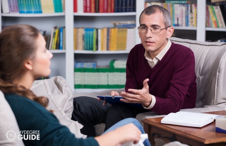 Career counselor giving advice to a student