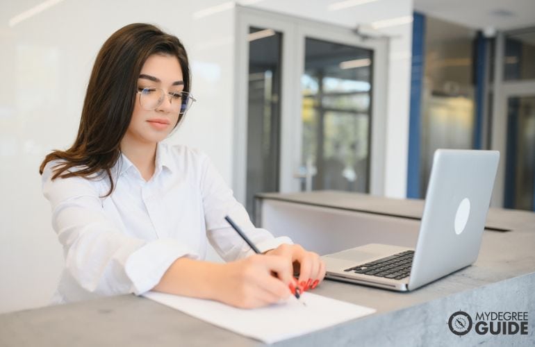 Woman preparing requirements for Learning Design and Technology Masters 