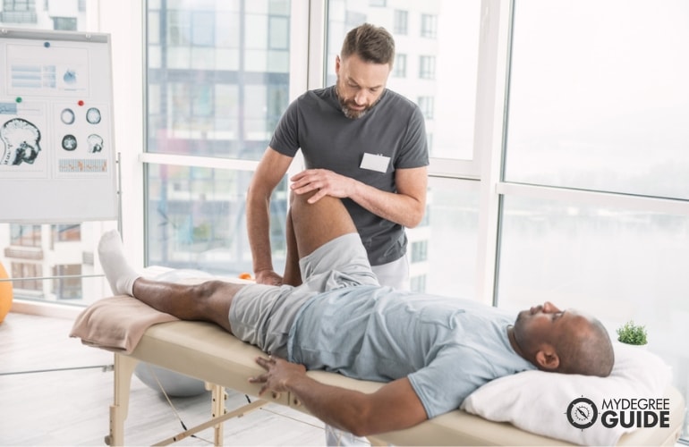 Physical Therapist Assistant with a patient
