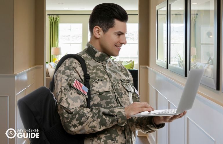 Military veteran checking college admission process online